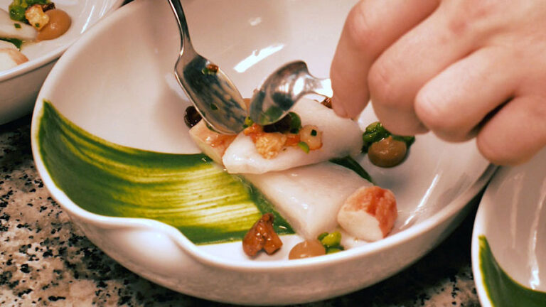 Plating food at restaurant